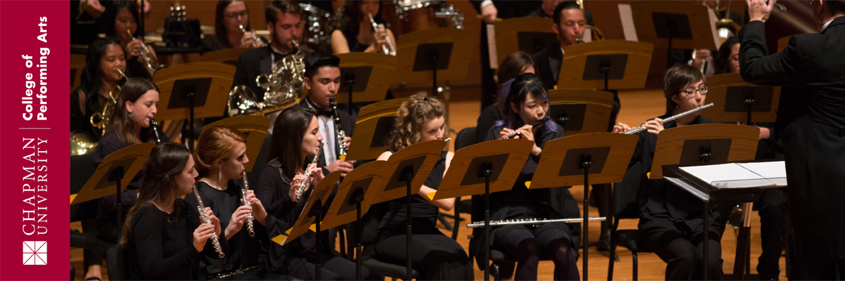 Chapman University College of Performing Arts written to the left side of an image of the Chapman Wind Symphony performing on stage. 