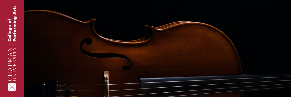 Chapman University College of Performing Arts |  A String instrument photographed against a dark backdrop.